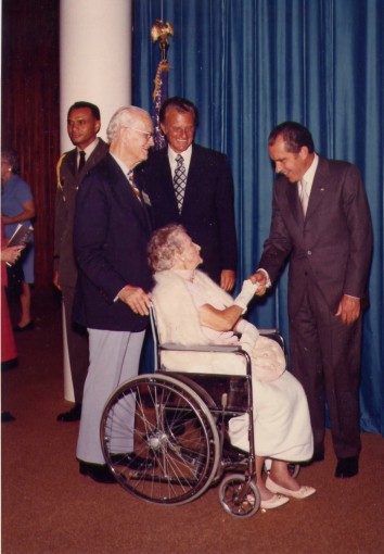 Image of Dr L. Nelson Bell, father-in-law of Billy Graham, Mrs. Bell and President Richard Nixon.